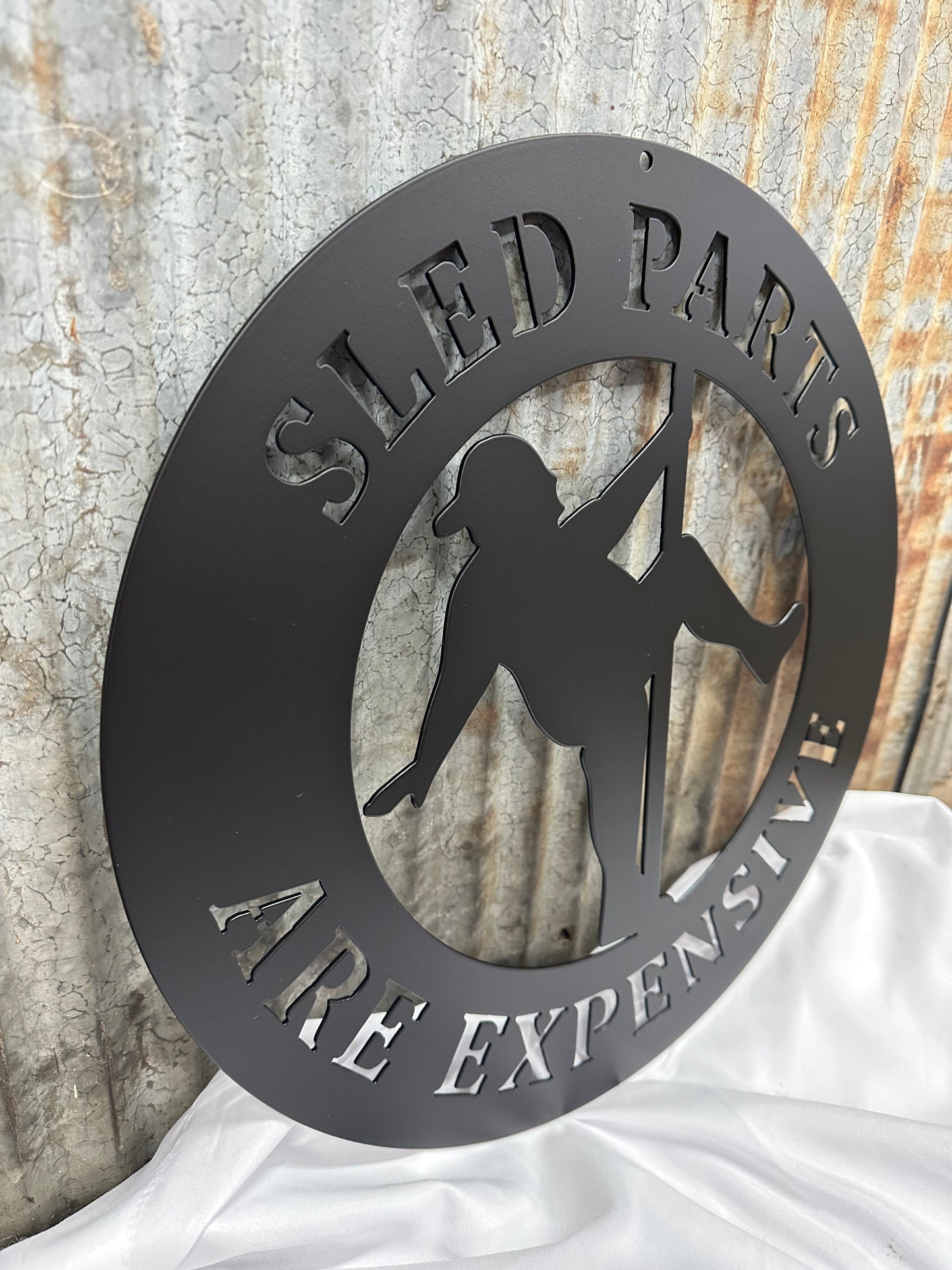 Sled Parts are Expensive Metal Wall Art